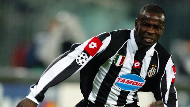 TURIN - FEBRUARY 25:  Lilian Thuram of Juventus runs with the ball during the UEFA Champions League Second Phase Group D match between Juventus and Manchester United held on February 25, 2003 at the Stadio Delle Alpi, in Turin, Italy. Manchester United won the match 3-0. (Photo by Phil Cole/Getty Images)