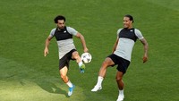 Mohamed Salah diandalkan di lini depan Liverpool sementara Virgil van Dijk bakal jadi andalan di lini belakang. (Andrew Boyers/REUTERS)