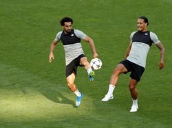 Mohamed Salah diandalkan di lini depan Liverpool sementara Virgil van Dijk bakal jadi andalan di lini belakang. (Andrew Boyers/REUTERS)