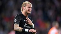 Loris Karius tahu persis betapa dirinya sudah berperan besar (secara negatif) dalam kekalahan Liverpool atas Real Madrid di final Liga Champions 2018. (Foto: Laurence Griffiths/Getty Images)