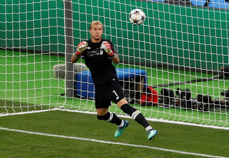 Soccer Football - Champions League Final - Real Madrid v Liverpool - NSC Olympic Stadium, Kiev, Ukraine - May 26, 2018   Liverpool's Loris Karius fumbles the ball as Gareth Bale scores Real Madrid's third goal   REUTERS/Phil Noble