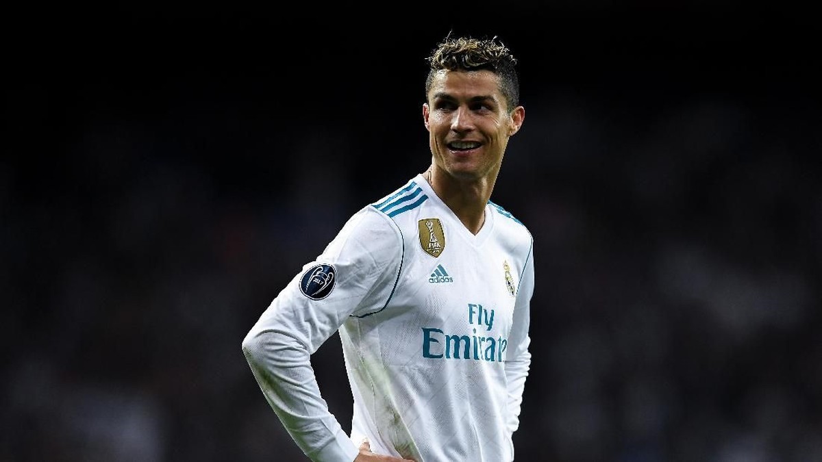 Cristiano Ronaldo diisukan hengkang dari Real Madrid, yang membuat gelandang Barcelona Ivan Rakitic senang mendengarnya. (Foto: David Ramos/Getty Images)