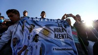 Para pendukung Argentina ini sangat berharap negaranya menjadi juara Piala Dunia setelah pada 2014 lalu harus puas menjadi runner-up. Foto: Agustin Marcarian/Reuters