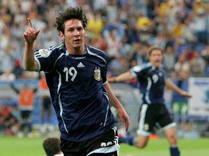GELSENKIRCHEN, GERMANY - JUNE 16:  Lionel Messi of Argentina celebrates scoring the sixth goal during the FIFA World Cup Germany 2006 Group C match between Argentina and Serbia & Montenegro at the Stadium Gelsenkirchen on June 16, 2006 in Gelsenkirchen, Germany.  (Photo by Laurence Griffiths/Getty Images)
