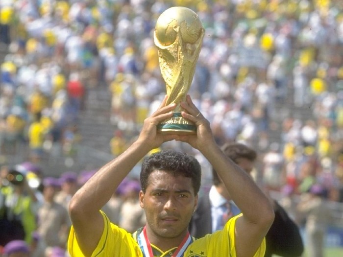 17 Jul 1994:  Romario of Brazil holds the trophy aloft after the World Cup final against Italy at the Rose Bowl in Los Angeles, California, USA. Brazil won the match 3-2 on penalties.  Mandatory Credit: Simon  Bruty/Allsport