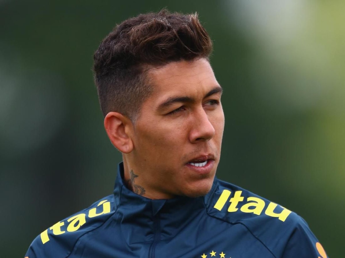 Roberto Firmino pernah tiru rambut Ronaldo pada 2002. (Foto: Clive Rose/Getty Images)
