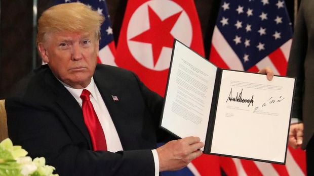 Foto dokumen yang ditunjukkan Trump menunjukkan isi kesepakatan.