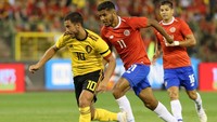 Eden Hazard sempat membuat fans Belgia was-was setelah terlihat mengalami masalah saat ditarik keluar di menit ke-70. Tapi Roberto Martinez memastikan bahwa tak ada yang serius dari cedera Hazard. Foto: Francois Walschaerts/Reuters