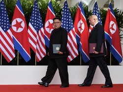 Trump Minta Terlihat Kurus Saat Difoto, Begini Ekspresi Kim Jong Un
