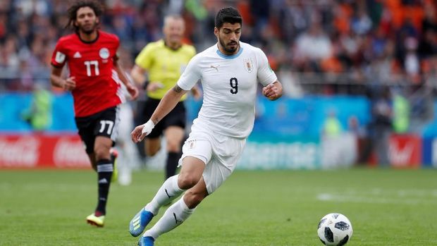 Luis Suarez dan Edinson Cavani konsisten menyerang hingga akhir pertandingan.