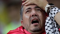 Ekspresi kekecewaan pendukung Tunisia. REUTERS/Ueslei Marcelino.