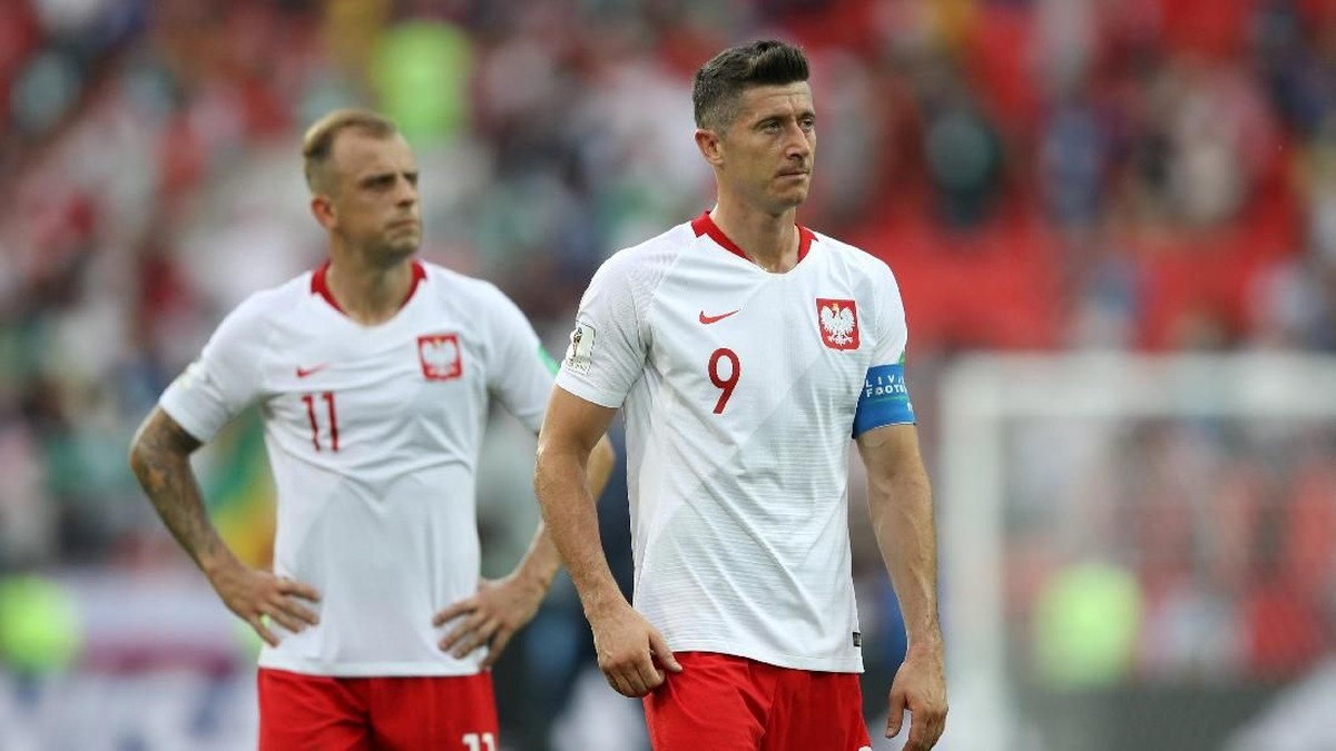 Kekecewaan Robert Lewandowski setelah Polandia dikalahkan Senegal (Foto: Carl Recine/Reuters)