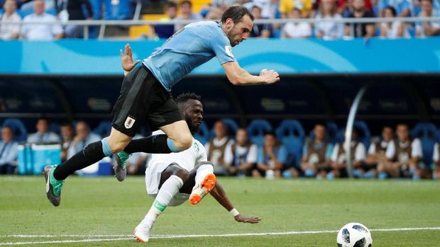 Diego Godin akan mendapat tugas mengawal Cristiano Ronaldo.