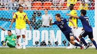 Jepang, yang berjuluk Samurai Biru, memastikan kemenangan 2-1 lewat sundulan Yuya Osako pada menit ke-73. Reuters/Jason Cairnduff.