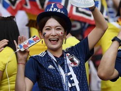 Kalau yang ini suporter cantik dari Jepang. Foto: Carl Court/Getty Images