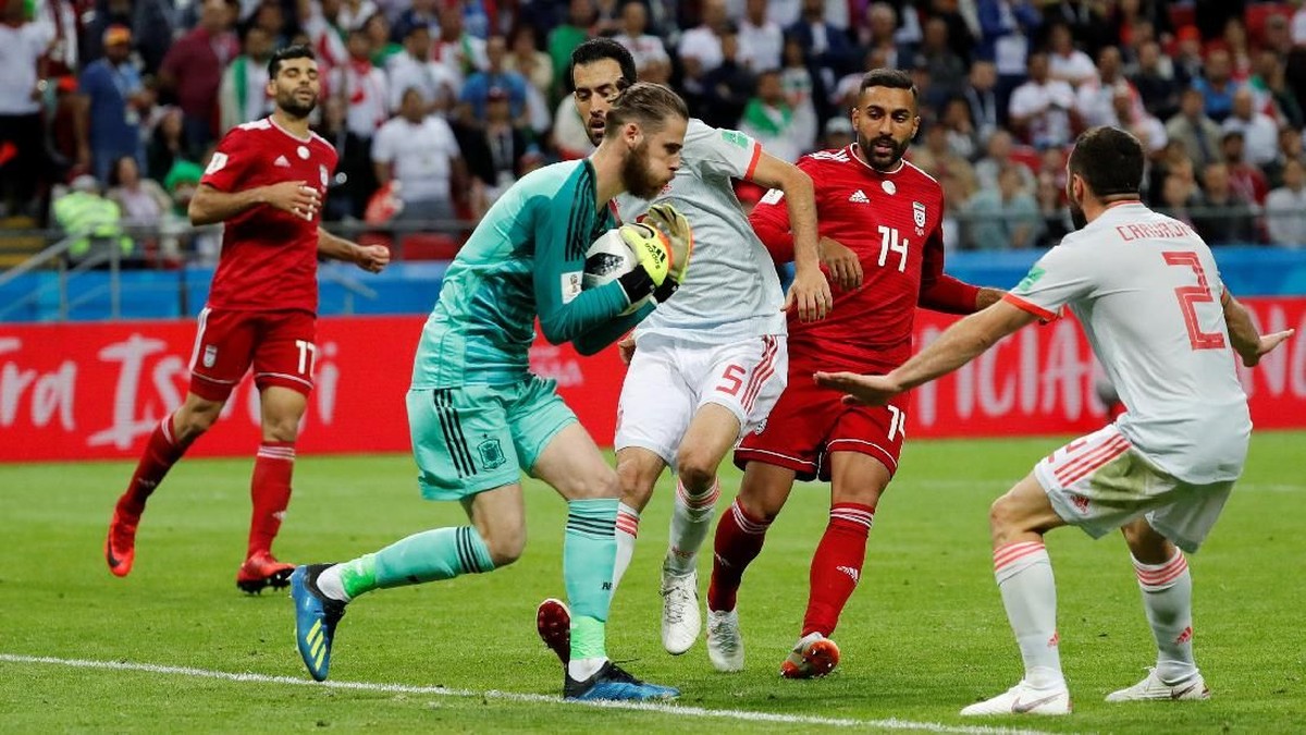 Spanyol menang susah payah atas Iran 1-0. (Foto: Toru Hanai/Reuters)