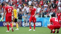 Para pemain Tunisia tampak kecewa karena tersingkir dari Piala Dunia 2018. Reuters/Albert Gea.