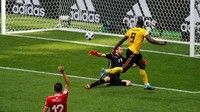 Romelu Lukaku membobol gawang Tunisia. Dalam pertandingan ini, Lukaku dua kali membobol gawang Tunisia. Gol-gol itu dicetak di menit ke-16 dan 45. Reuters/Kai Pfaffenbach.
