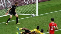 Michy Batshuayi turut menyumbangkan satu gol untuk Belgia di menit ke-90. Reuters/Kai Pfaffenbach.