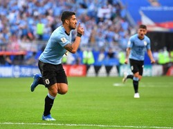 Luis Suarez merayakan gol. Reuters/Dylan Martinez.