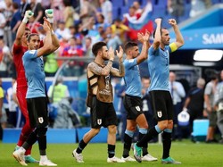 Dengan hasil ini, Uruguay mengumpulkan sembilan poin dari tiga laga dan lolos ke babak 16 besar dengan status juara Grup A. Reuters/Pilar Olivares.