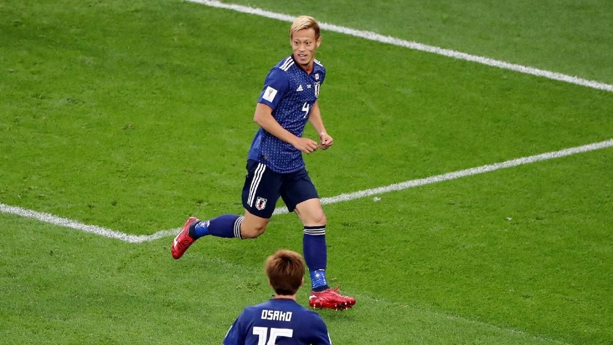 Keisuke Honda mencetak sejarah lewat golnya ke gawang Senegal di Piala Dunia 2018 (Foto: Marcos Brindicci/Reuters)