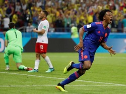 Cuma berselang lima menit, Polandia kembali kebobolan. Kali ini gawang mereka dijebol oleh Juan Cuadrado. Foto: Toru Hanai/Reuters