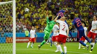 Kolombia memimpin 1-0 berkat sundulan Yerry Mina pada menit ke-40. Keunggulan tersebut bertahan hingga jeda pertandingan. Foto: John Sibley/Reuters