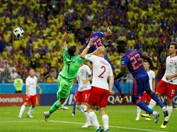 Kolombia memimpin 1-0 berkat sundulan Yerry Mina pada menit ke-40. Keunggulan tersebut bertahan hingga jeda pertandingan. Foto: John Sibley/Reuters