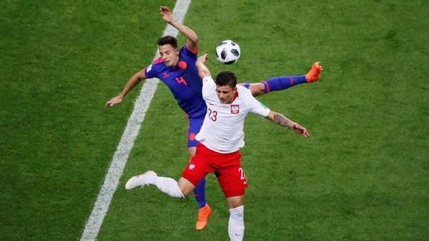 Polandia mendominasi penguasaan bola di 15 menit awal.