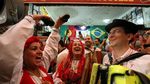 Suporter Portugal dan Spanyol Pesta Kelolosan, Iran dan Maroko berduka