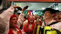 Suporter Portugal dan Spanyol Pesta Kelolosan, Iran dan Maroko berduka