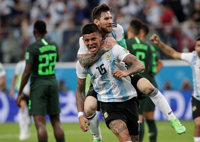 Soccer Football - World Cup - Group D - Nigeria vs Argentina - Saint Petersburg Stadium, Saint Petersburg, Russia - June 26, 2018   Argentinas Marcos Rojo celebrates scoring their second goal with Lionel Messi    REUTERS/Henry Romero