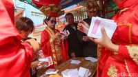 TPS Unik Berbusana Tionghoa