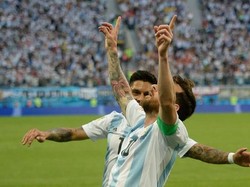 Selebrasi Messi setelah menciptakan gol pembuka untuk Argentina. olga Maltseva/AFP/Getty Images.