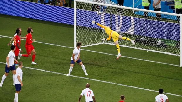 Pickford gagal menjangkau bola hasil tendangan pemain timnas Belgia Adnan Januzaj.