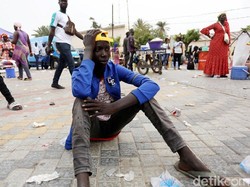 Seorang warga menangisi kekalahan Senegal. Reuters/Mikal McAllister.