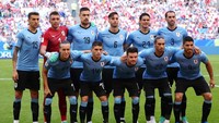 Uruguay berhasil menjadi juara Grup A dan berhasil memastikan negaranya melaju ke babak 16 besar usai kalahkan rusia 2-0. Michael Dalder/Reuters.
