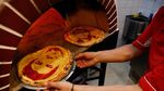 Jadi Idola, Wajah Ronaldo dan Suarez jadi Topping Pizza di Hop Head Cafe