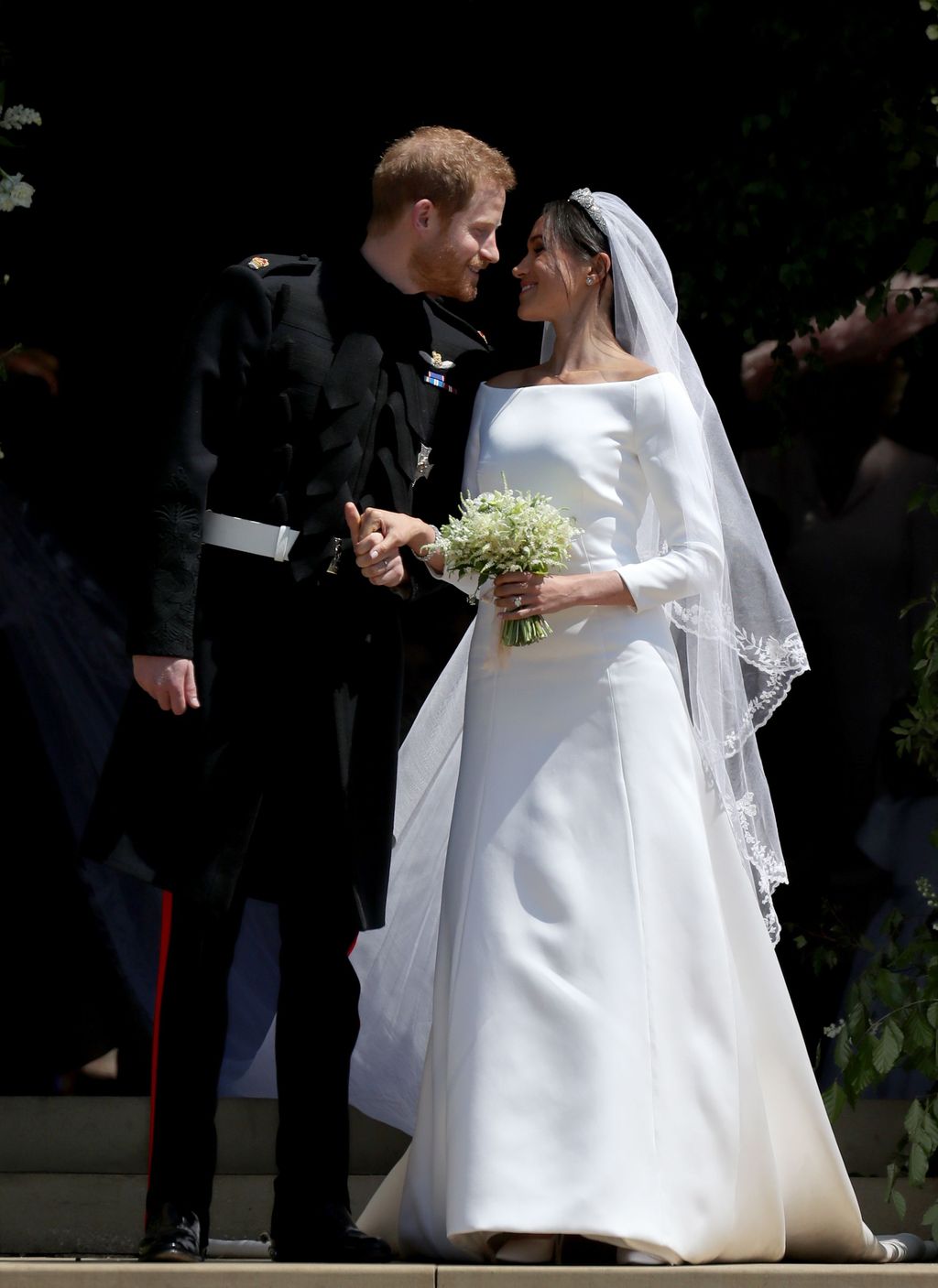 CHESTER, ENGLAND - JUNE 14:  Queen Elizabeth II sits with Meghan, Duchess of Sussex during a ceremony to open the new Mersey Gateway Bridge on June 14, 2018 in the town of Widnes in Halton, Cheshire, England. Meghan Markle married Prince Harry last month to become The Duchess of Sussex and this is her first engagement with the Queen. During the visit the pair will open a road bridge in Widnes and visit The Storyhouse and Town Hall in Chester.  (Photo by Jeff J Mitchell/Getty Images)