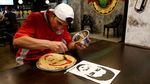 Jadi Idola, Wajah Ronaldo dan Suarez jadi Topping Pizza di Hop Head Cafe