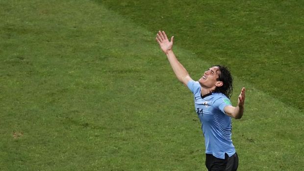Edinson Cavani mencetak gol kedua di Piala Dunia 2018.