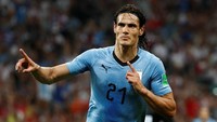 Edinson Cavani tampil apik saat memborong gol kemenangan Uruguay atas Portugal di 16 besar, membuatnya jadi man of the match pertandingan itu. Kini Uruguay harap-harap cemas menanti dirinya fit untuk laga 16 besar. (Foto: Murad Sezer/Reuters)