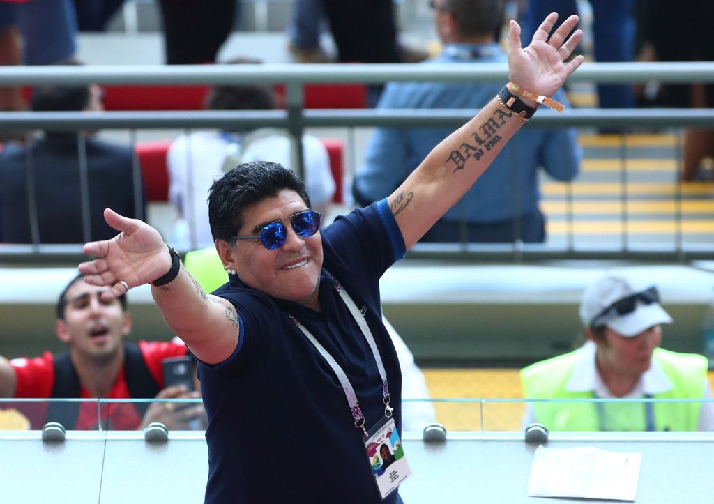 Soccer Soccer - World Cup - Round of 16 - France vs Argentina - Kazan Arena, Kazan, Russia - June 30, 2018 Diego Maradona makes gestures in the stands at half-time REUTERS / Pilar Olivares