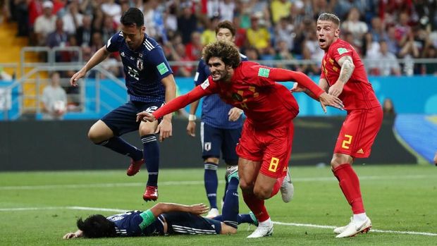 Marouane Fellaini mencetak gol penyeimbang Belgia.
