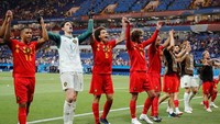 Para pemain Belgia merayakan kemengan mereka. REUTERS/Toru Hanai.