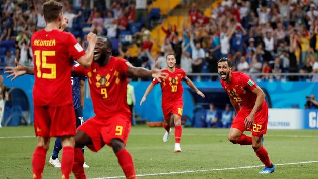 Belgia meraih kemenangan lewat gol Nacer Chadli (kanan).