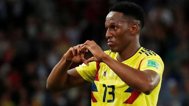 Pemain timnas Kolombia Yerry Mina mencetak gol ke gawang Inggris di menit akhir.