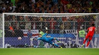 Dalam laga ini Inggris keluar sebagai pemenang di adu tos-tosan dengan skor 4-3. Reuters/Kai Pfaffenbach.