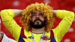 Ragam Ekspresi Kecewa Fans Kolombia: Tertunduk Lesu, Duduk Termangu
